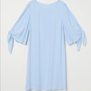 Trumpet sleeve dress